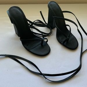 Black strappy sandals.